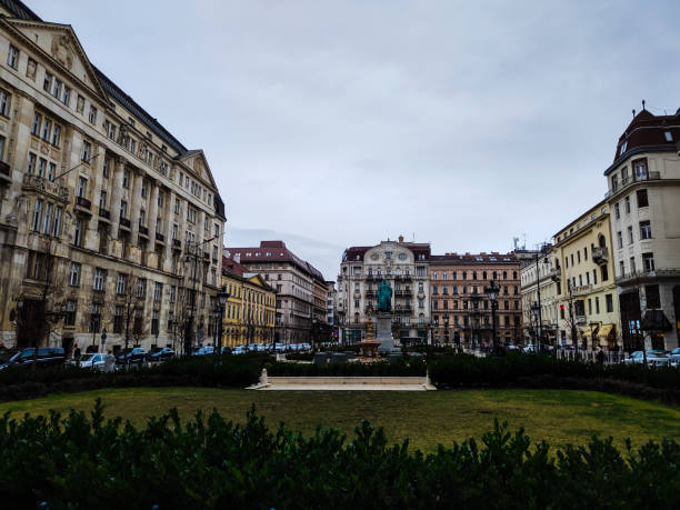 istock Unbelievable garden with statue and buildings 1367906276