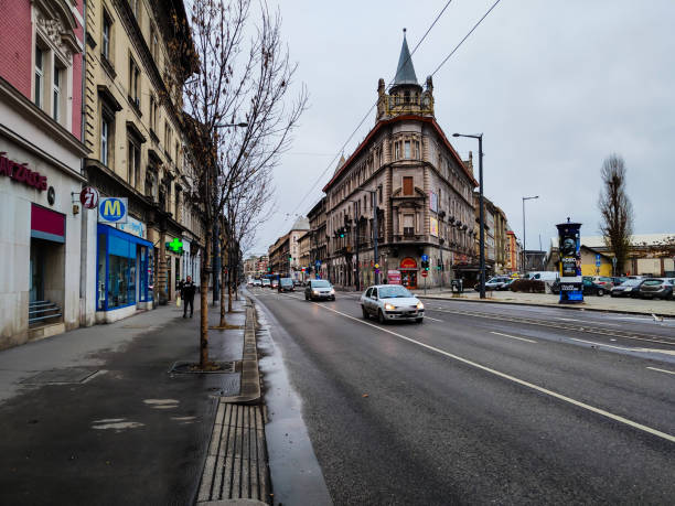 istock Cars ride through street 1367906294