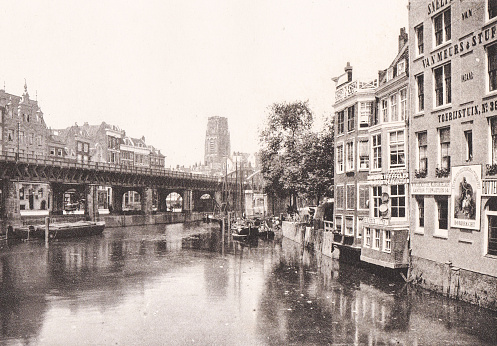 Canals run through Rotterdam, Netherlands, in this photo of the cityscape. Photo by Dr. Charles Mitchell commissioned for an 1894 book about Holland. Source: Original edition is from my own archives. Copyright has expired and is in Public Domain.