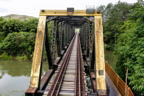 istock Old railway bridge, with iron trellis, in perspective 1367923026
