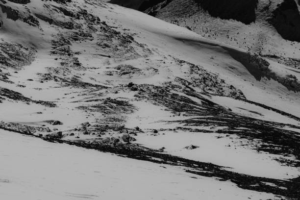 istock Snow blanket on the rocky mountain. 1367925309
