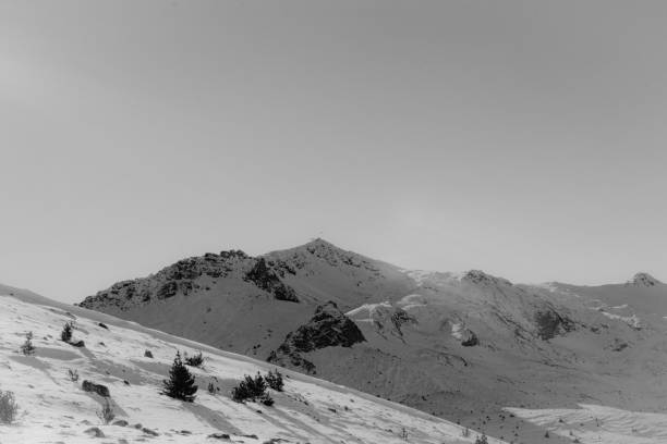 istock Idyllic mountain landscape with snow on a sunny day. 1367925408