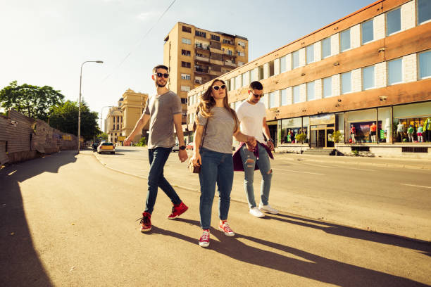 istock Group of friends having fun in down town 1367929891