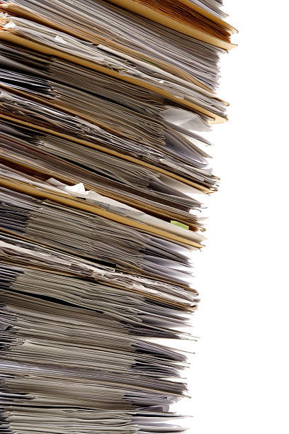 istock Close-up of stacked file folders against white background 136793119