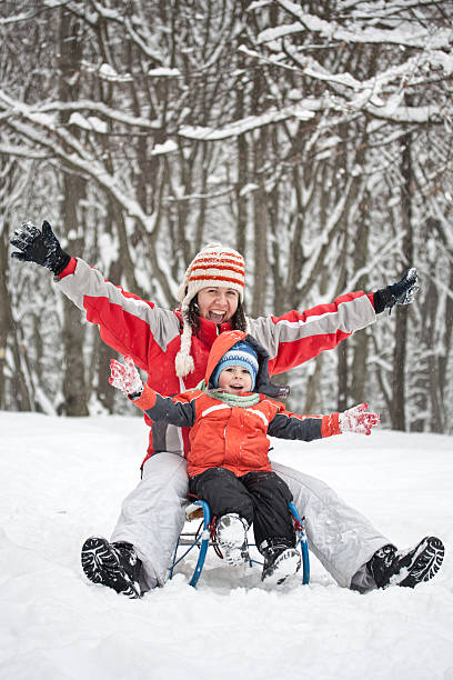 istock Little boy and mother sliding 136793173
