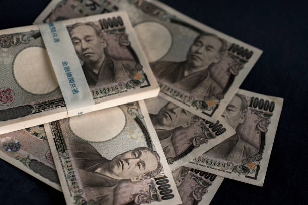 istock Randomly placed Japanese 10,000 yen bills 1367932674