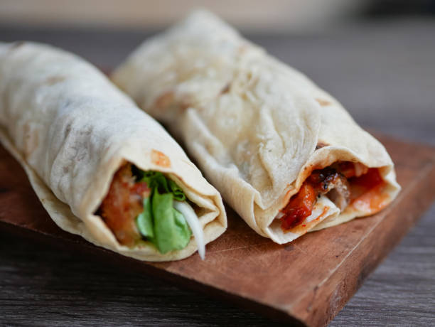istock kebab on a wooden cutting board. soft focus 1367933533