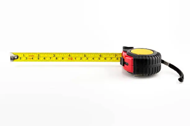 View of a measuring tape isolated on a white background.
