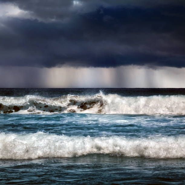 istock Spooky seascape and breaking waves during tropical storm 1367939043
