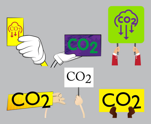 istock Hand holding up a banner with CO2 text. Emissions emission Carbon dioxide air pollution reduction zone concept. 1367940188