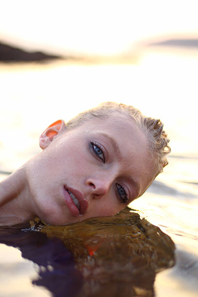 istock Woman and the sea 136794709