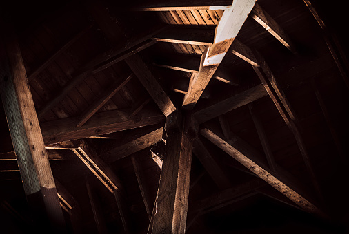 Timber roof truss with beautiful interplay of light and shadows.
