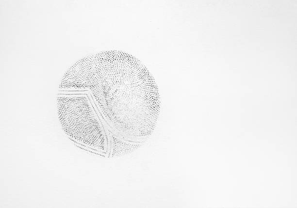 istock Black soccer ball print or stain on white painted textured wall. 1367948930
