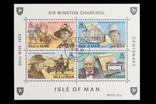 Isle of Man postage stamp, on black background. studio shot. 1974. Sir Winston Churchill