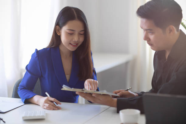 istock Business client discussing with sale officer 1367950951