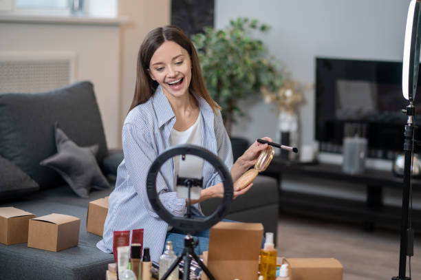 istock Young pretty woman having an online tutorial on beauty tips 1367953514
