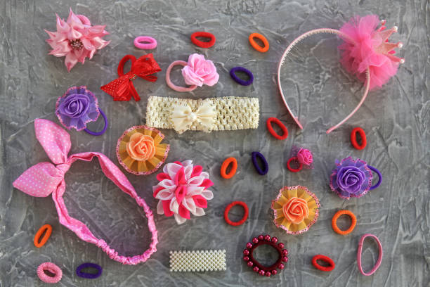 istock Different hair clips on gray background. Flat lay. Top view. 1367954846