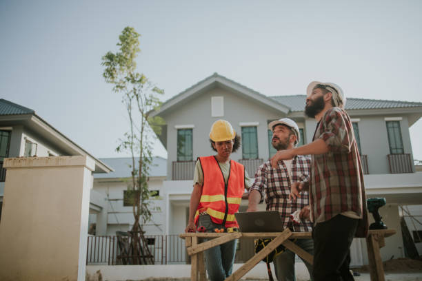 istock Checking work with construction detail of home building 1367954974