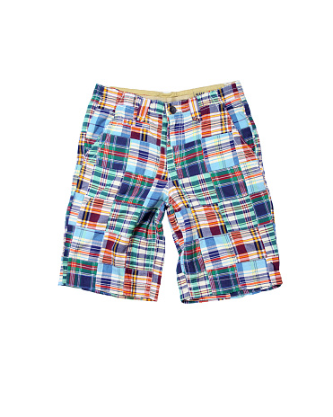 A pair of colorful rainbow shorts isolated on a white background.
