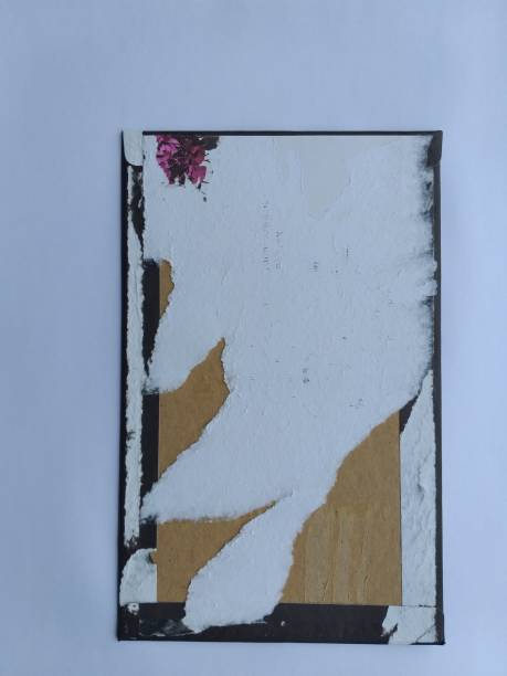 istock torn white paper background photo 1367956076