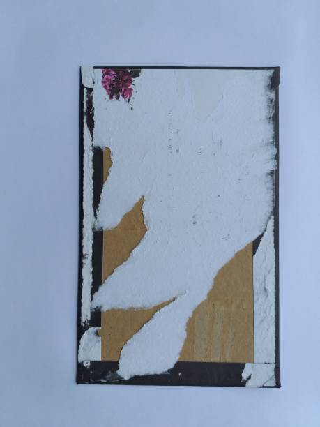 istock torn white paper background photo 1367956091