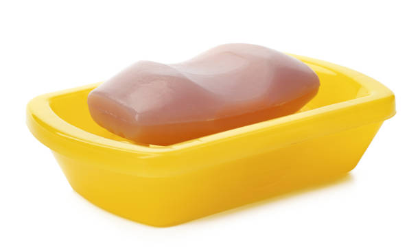 istock Soap on a plastic soap dish isolated on a white background 1367957531