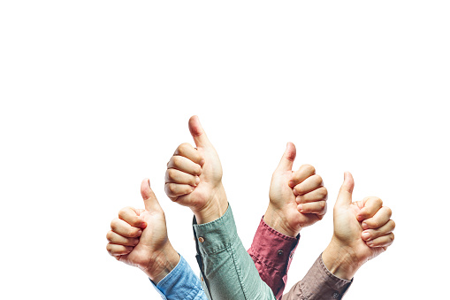 Hands showing thumb up sign against isolated on white background. Men showing OK sign