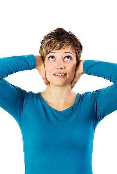 istock Beautiful woman looking up pensive 136796212