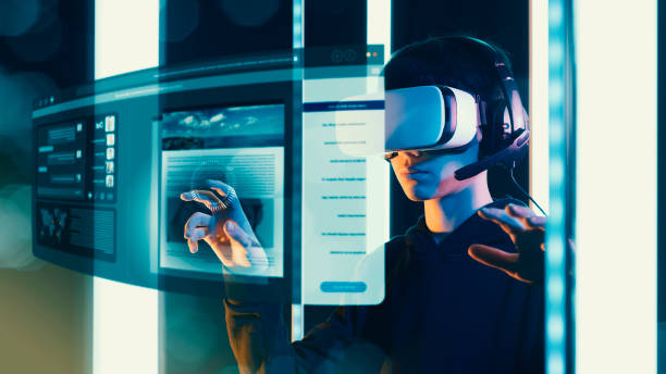 istock Teenager interacting with virtual screens 1367965301