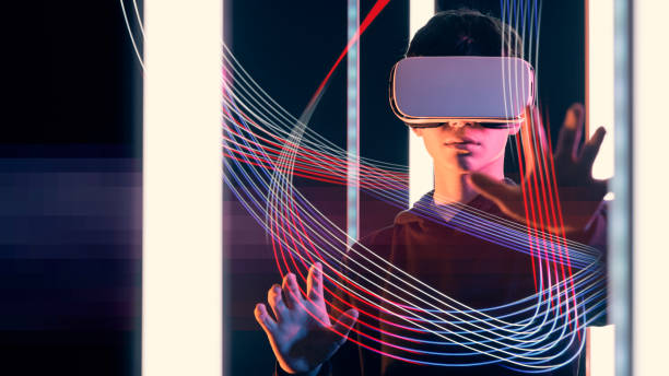 istock Teenager interacting with virtual reality 1367965358