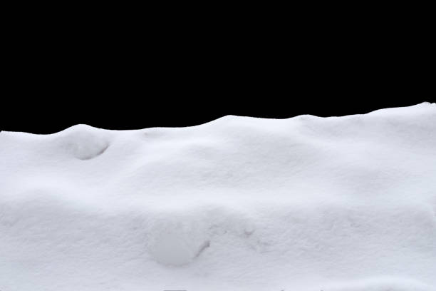 istock snow isolated on a black background. winter design element 1367966136