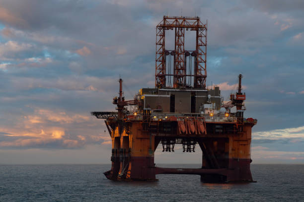 istock offshore oil rig at sunset 1367968457