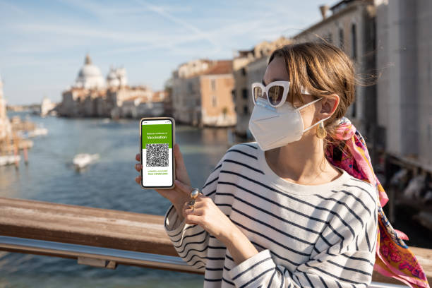 istock Woman with vaccination certificate while traveling in Italy 1367971810