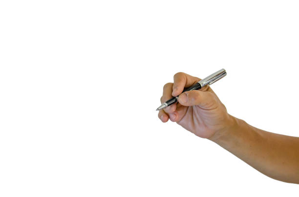 istock hand holding a pen writing on a white background 1367974493