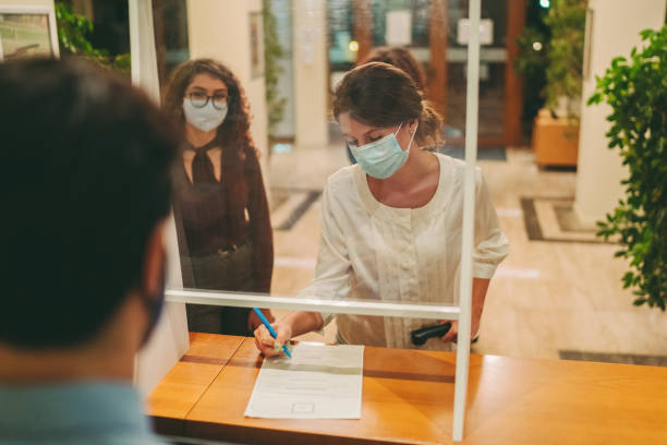 istock Hotel check in during COVID-19 pandemic 1367977893