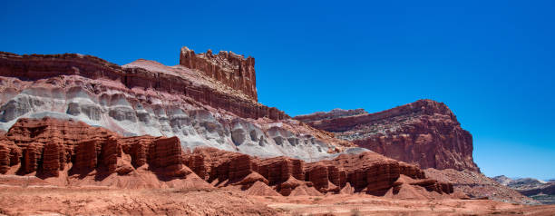 istock Capitol Reef National Park, Utah. Red rocks under a blue summer sky. 1367981706