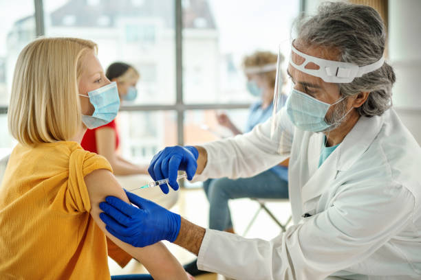 istock Young woman having Covid-19 vaccine. 1367981919