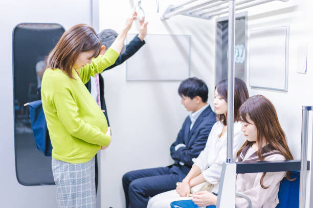istock Pregnant women traveling by train 1367982052