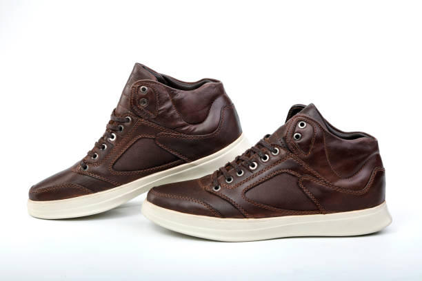 a pair of men's brown shoes , men's shoes - sewing foot imagens e fotografias de stock