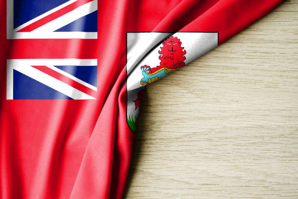The image shows the national flag of Trinidad and Tobago, featuring its iconic red field crossed diagonally by a bold black band edged in white. The striking design symbolizes strength, purity, and the nation’s vibrant identity.