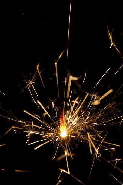 istock Burning christmas sparkler on black background 136798731