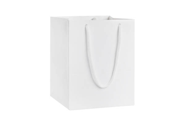 istock White craft small paper bag packaging template isolated on white background. Stand-up pouch side view package. Brown shopping bag mockup. Package with handle for shopping, advertising and branding 1367988739