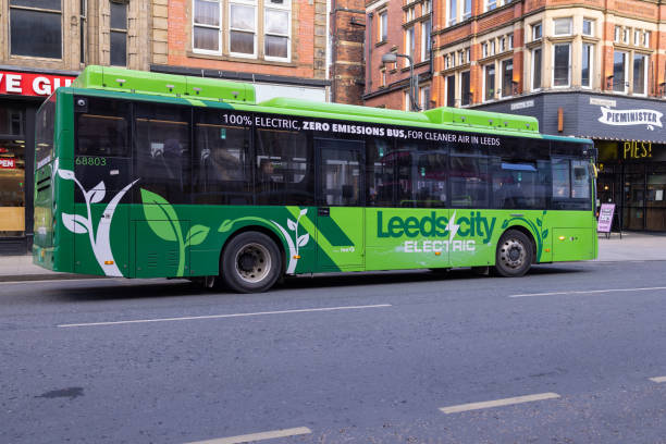 Photo taken in the Leeds City Centre showing an electric bus in the city, the bus is 100% Electric with zero Emissions for cleaner air in the Leeds City Centre stock photo