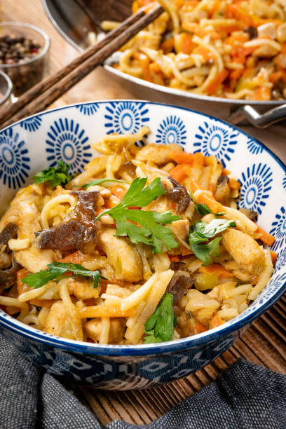 istock Fried noodles with chicken and vegetables. 1367991235