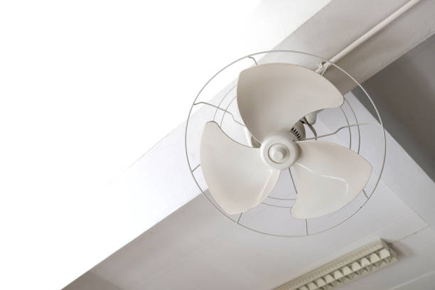 istock Electric ceiling fans in an incomplete condition inside a building. 1367991758