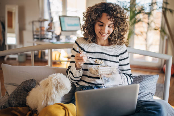 istock Young woman eating healthy 1367992793