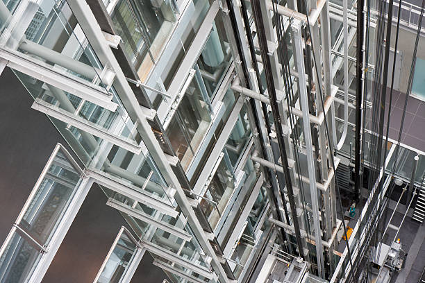 istock Looking down in  an open steel lift shaft 136799485