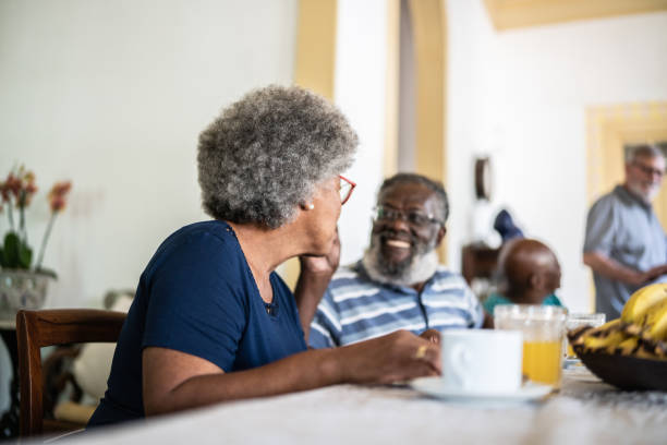 istock Happy senior couple having breakfast together 1368003309
