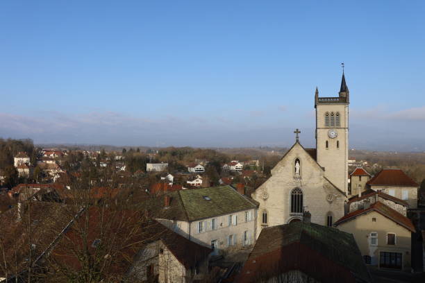 istock Morestel - View of the bell tower and roofs 1368005787