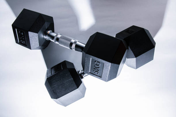 istock Pair of dumbbells isolated on white background. 1368006140
